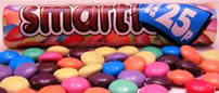Smarties is a British candy which is a favorite among  Caribbean children (and adults).  English chocolate.